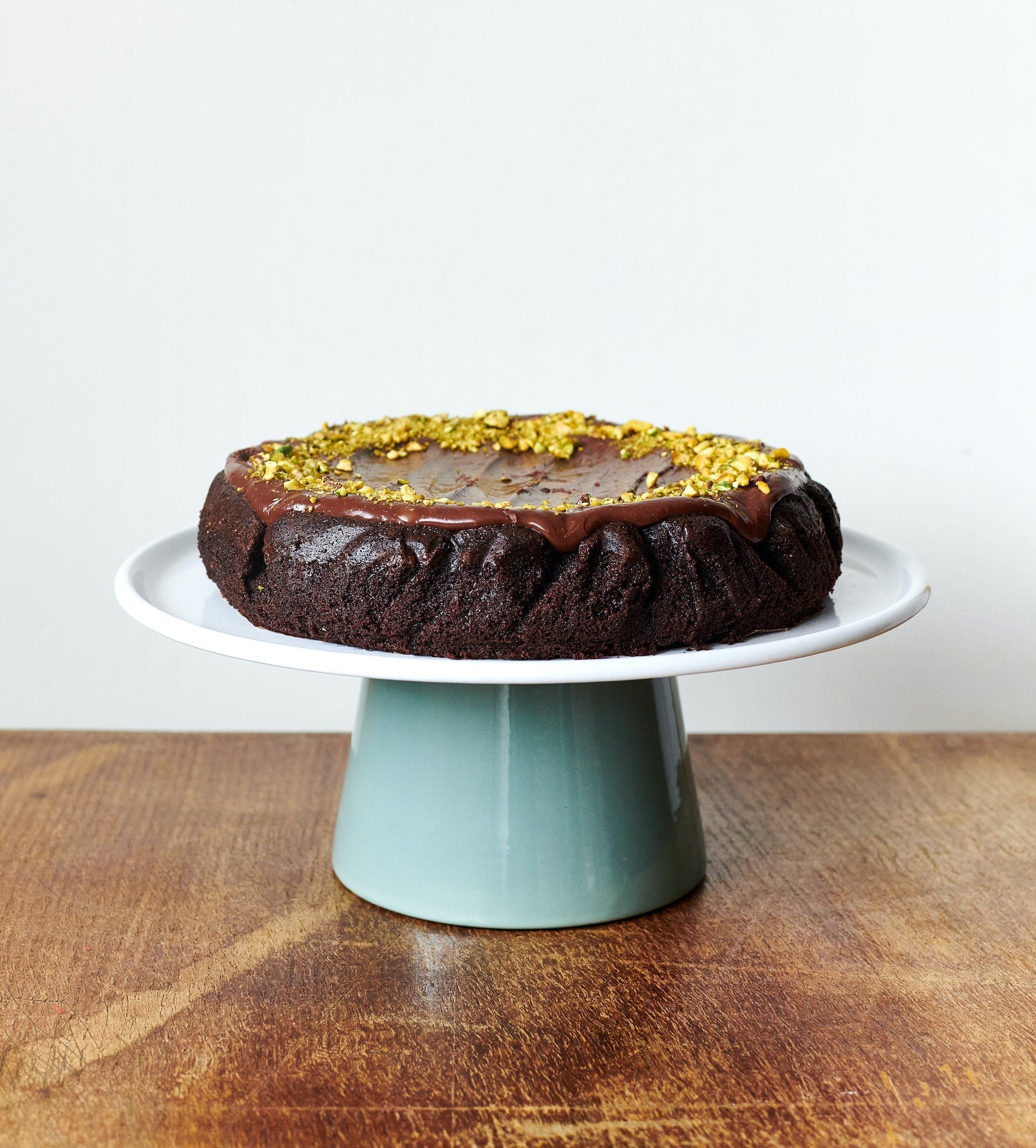 Should Cafés Bake Their Own Cakes or Buy Wholesale?
