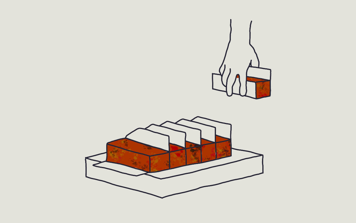 A line drawing of Exploding Bakery cake being displayed. 